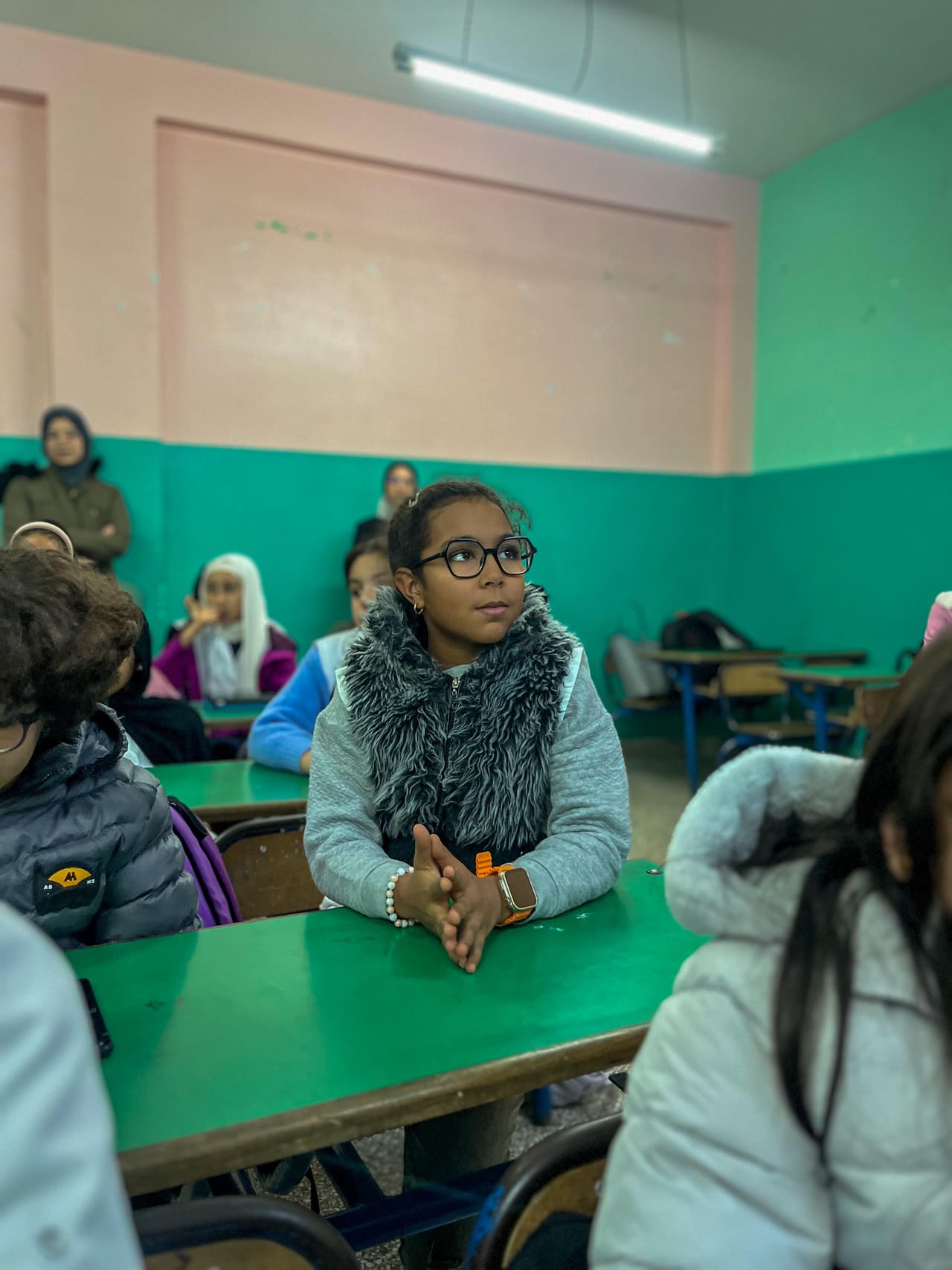 A student listening during a Chnondir session in a Moroccan public school